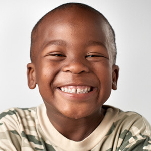 closeup of young man smiling 